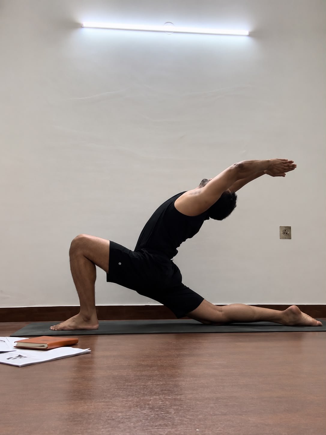 Abhishek demonstrating Anjaneyasana, a low lunge backbend